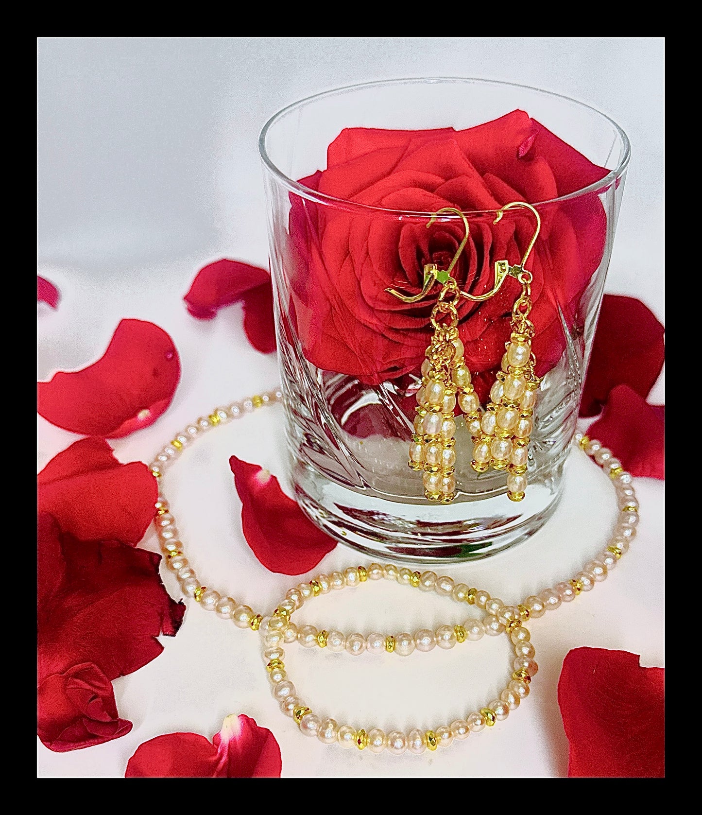 **Timeless Elegance: Golden Pearl Chandler Earrings**