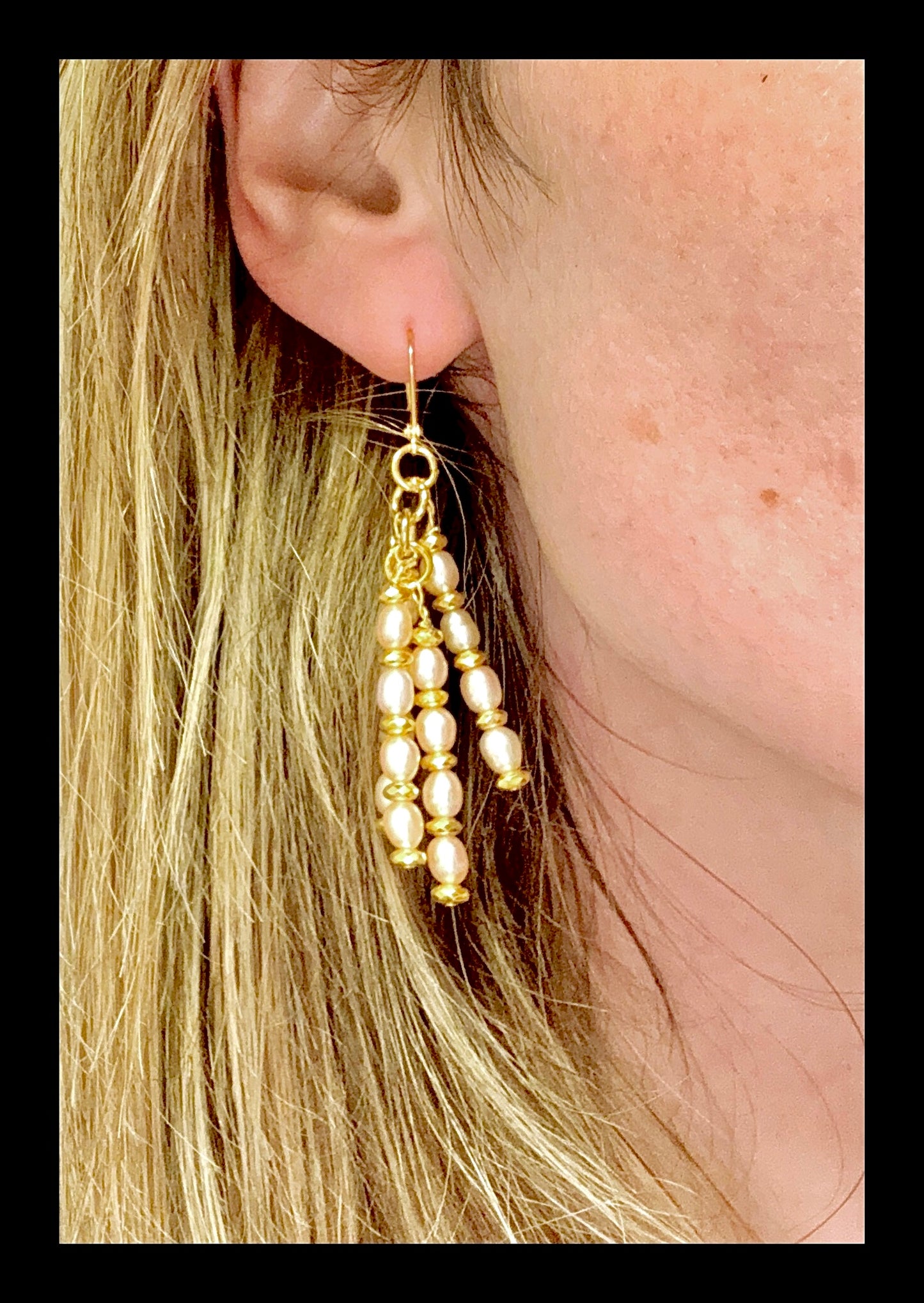 **Timeless Elegance: Golden Pearl Chandler Earrings**