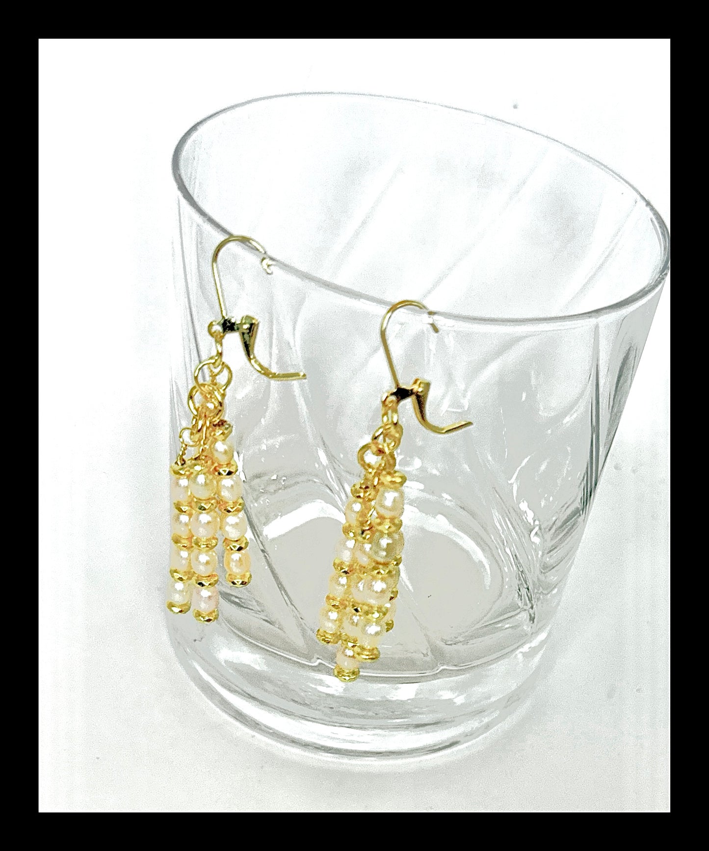 **Timeless Elegance: Golden Pearl Chandler Earrings**