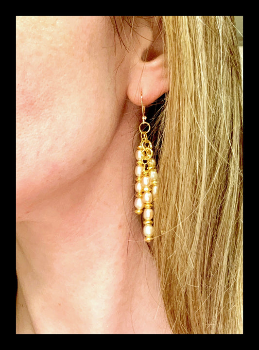 **Timeless Elegance: Golden Pearl Chandler Earrings**